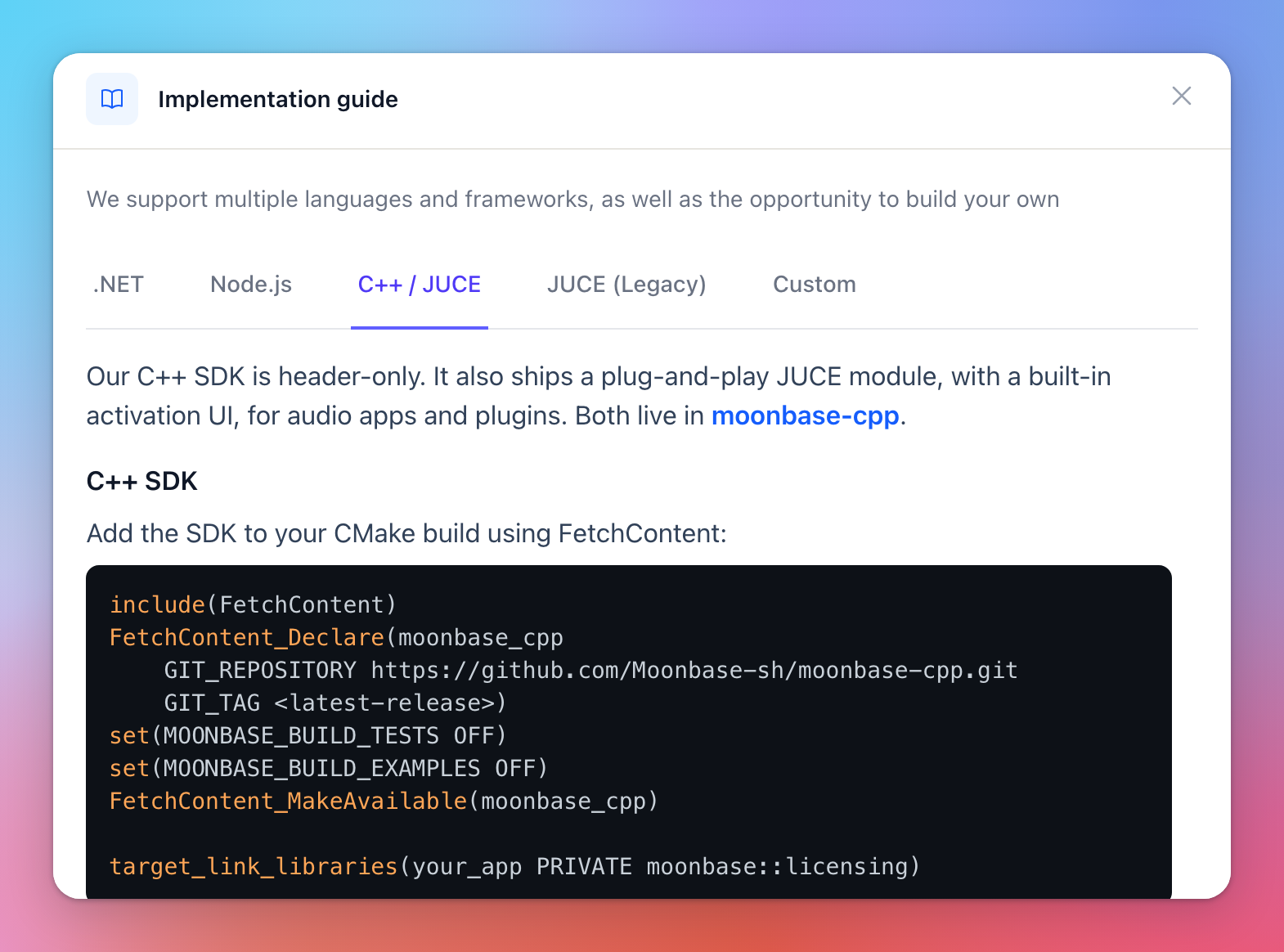 The Implementation guide on the C++ / JUCE tab, with the CMake setup for the C++ SDK