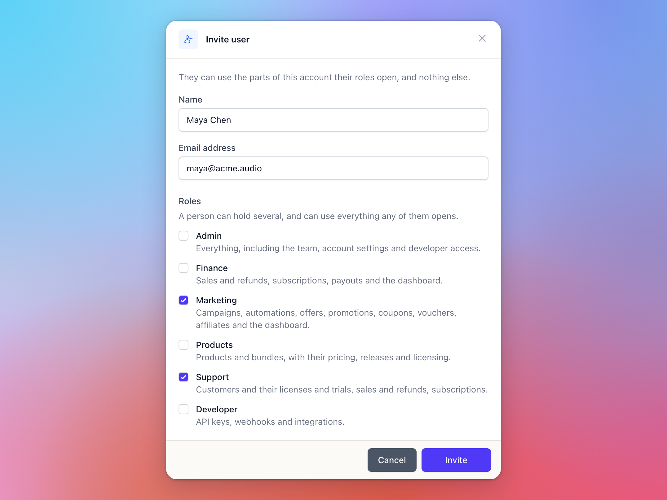 The Invite user dialog with a name, an email address, and the Marketing and Support roles ticked